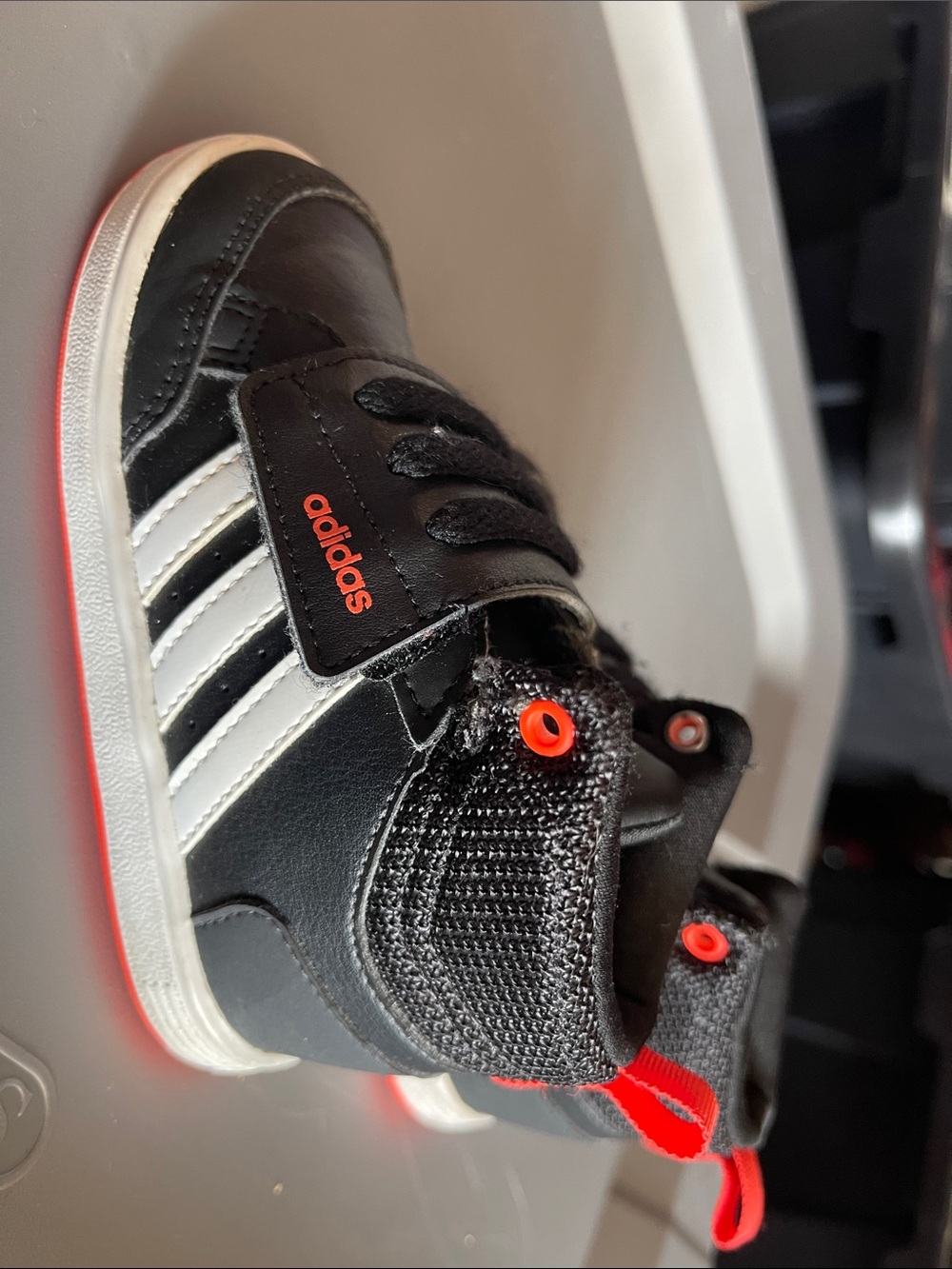 6K adidas Kids Black White Sneakers with red orange Accents. Velcro front